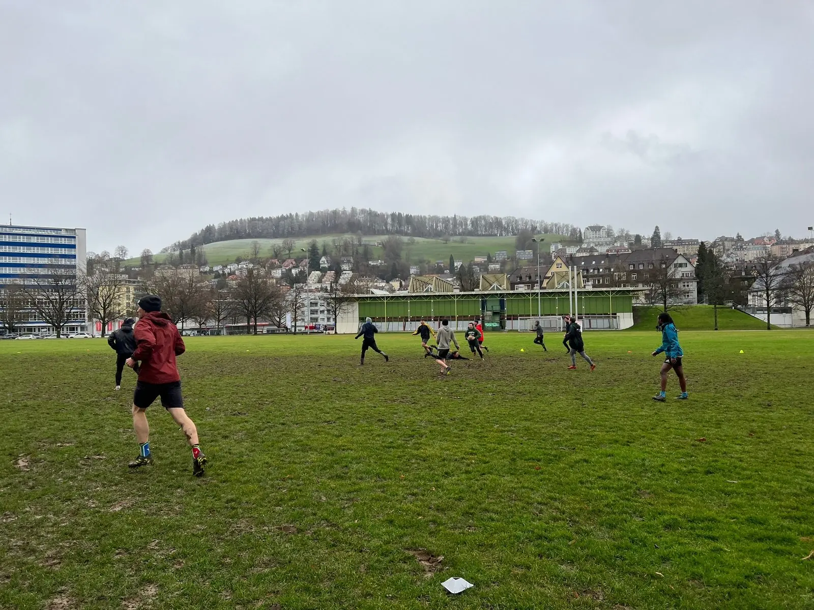 Muddy pitch during a winter touch rugby training session